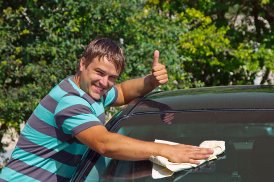 Commercial car washes use harsh chemicals that can damage your car's finish